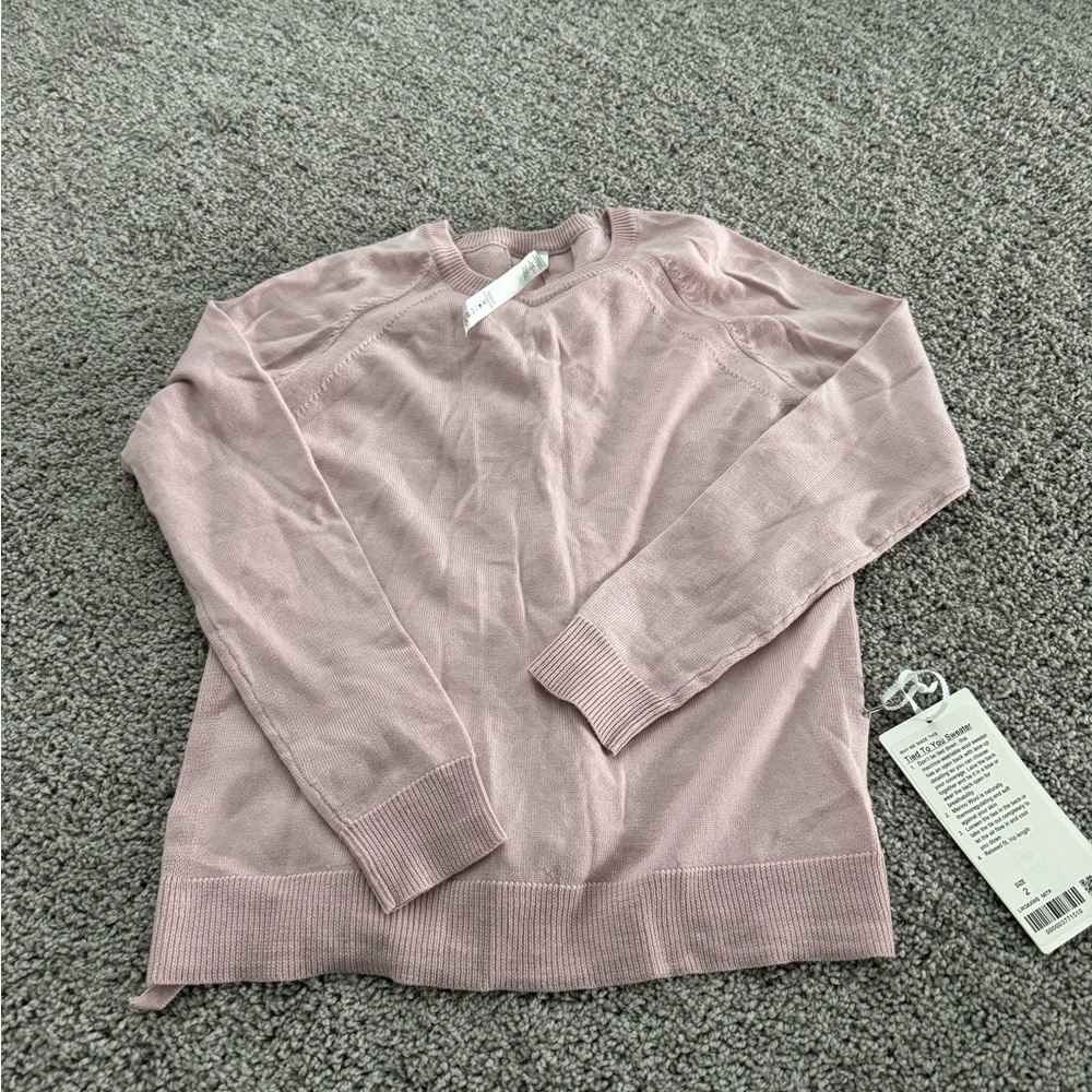 Lululemon sweater size 2 new with tag pink color